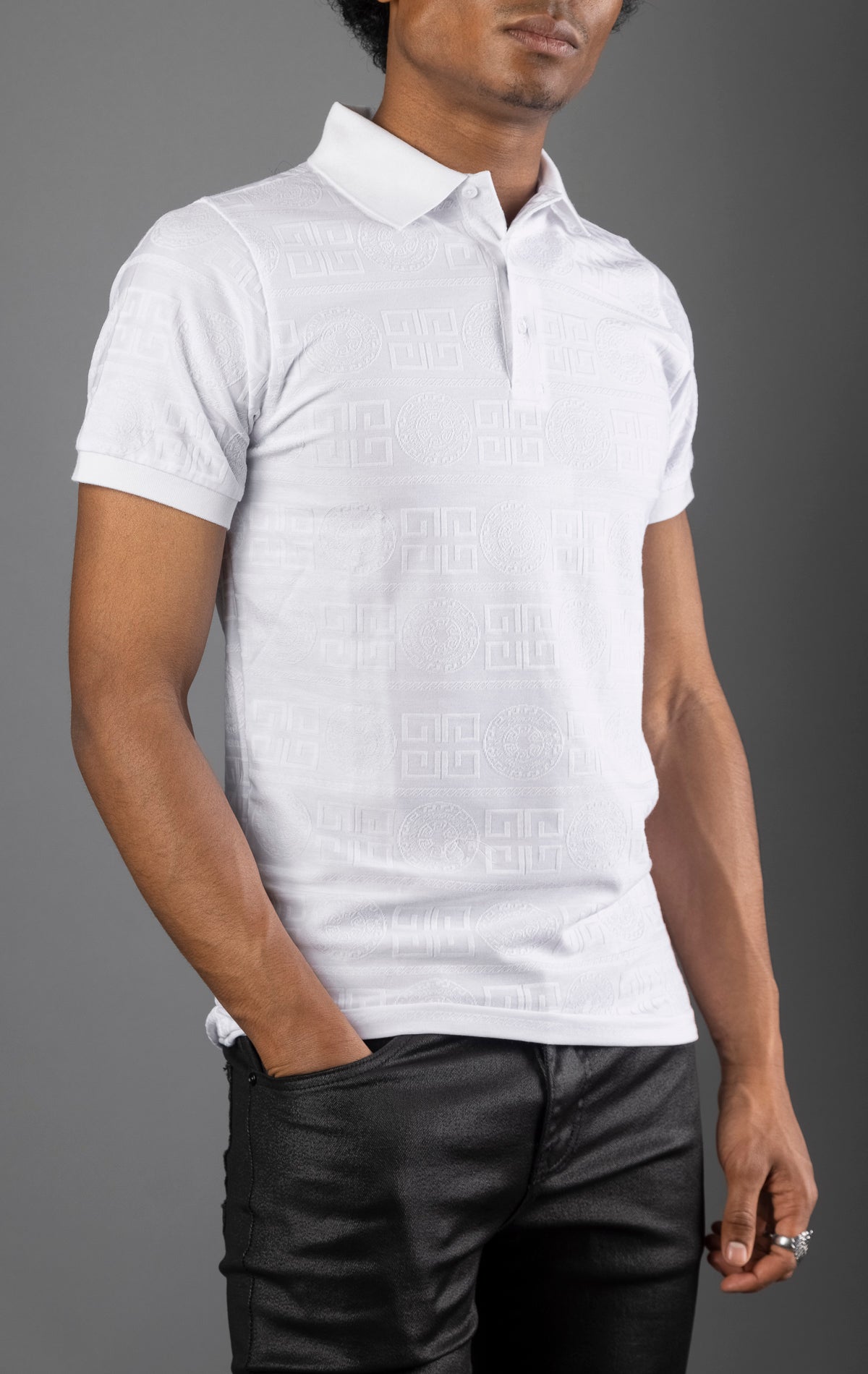 White Men's regular-fit, short-sleeve polo shirt. The shirt features a seamless Greek pattern and a classic polo design