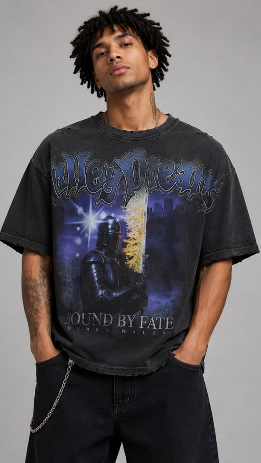Person wearing a black t-shirt with graphic design and text on a gray background