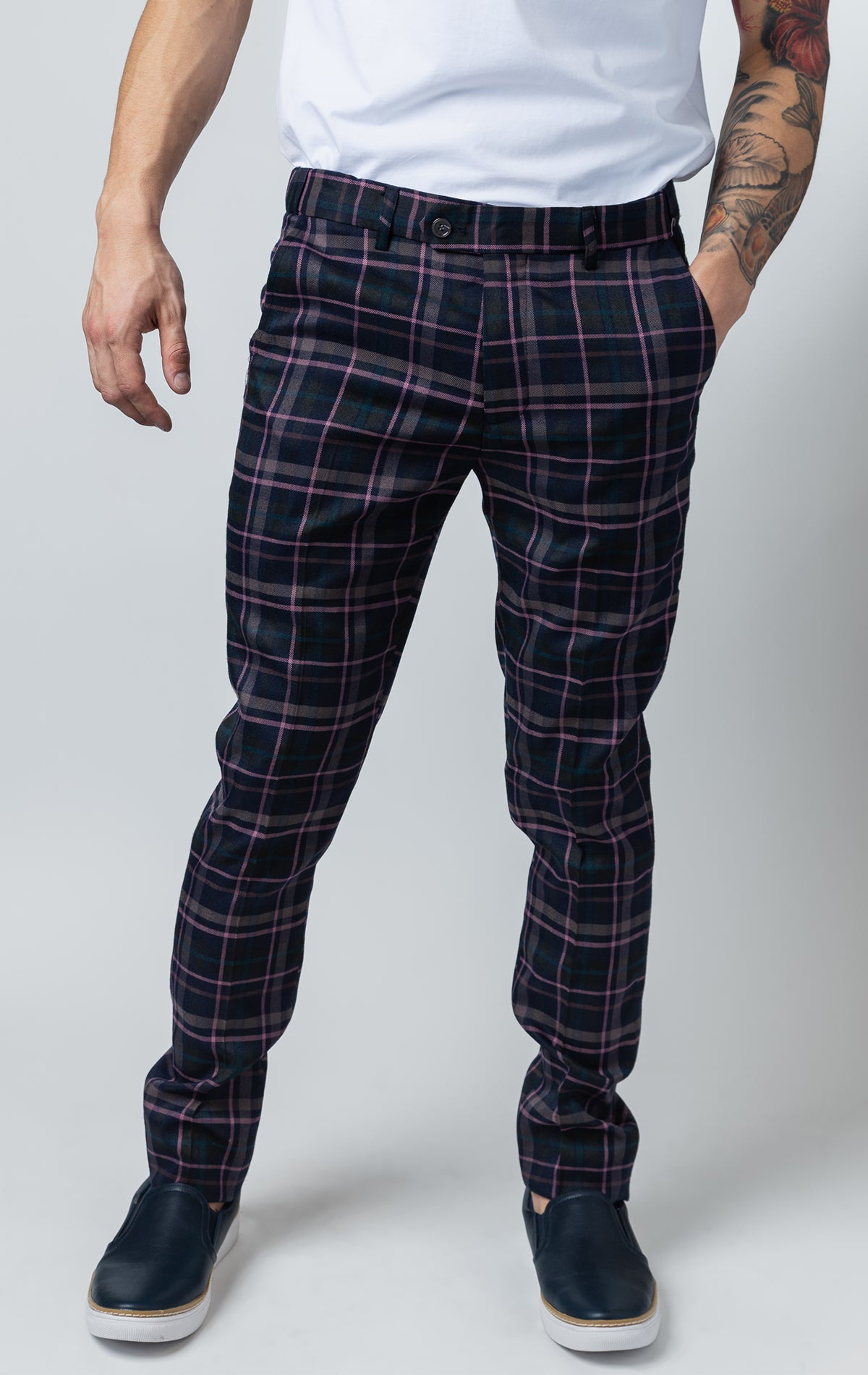 Men's purple chino pants with a checkered plaid design. The pants feature an elastic waistband for comfort and stretch, and are made from a lightweight cotton-spandex blend fabric. Inseam is 32 inches.
