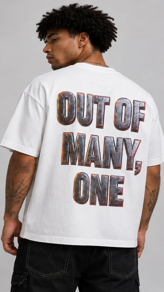 Person wearing a white t-shirt with 'OUT OF MANY, ONE' text on the back.