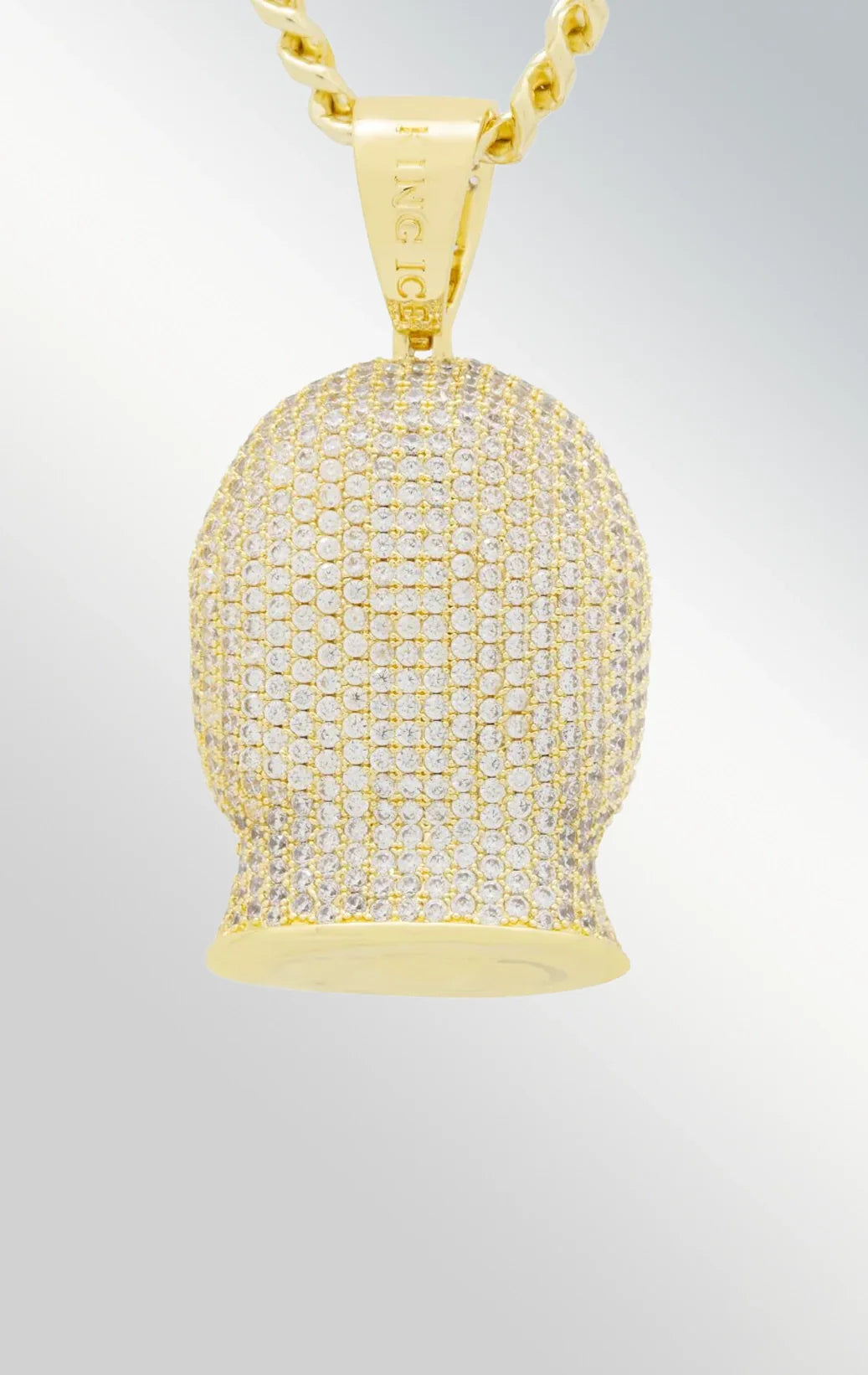 Ski mask necklace in gold