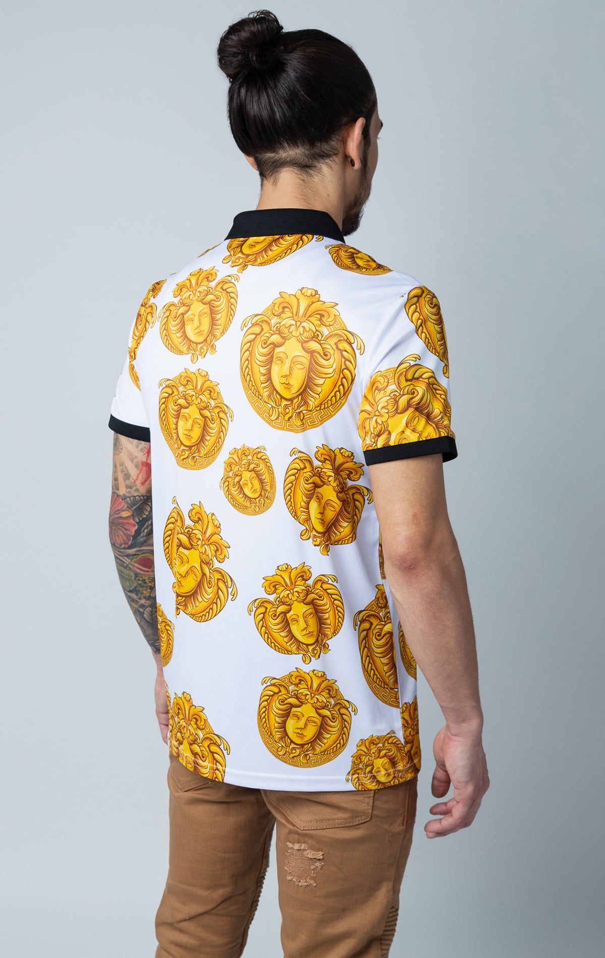 Stylized all over graphic polo shirt with collared detailing, short-sleeved composition, three button front fastening/