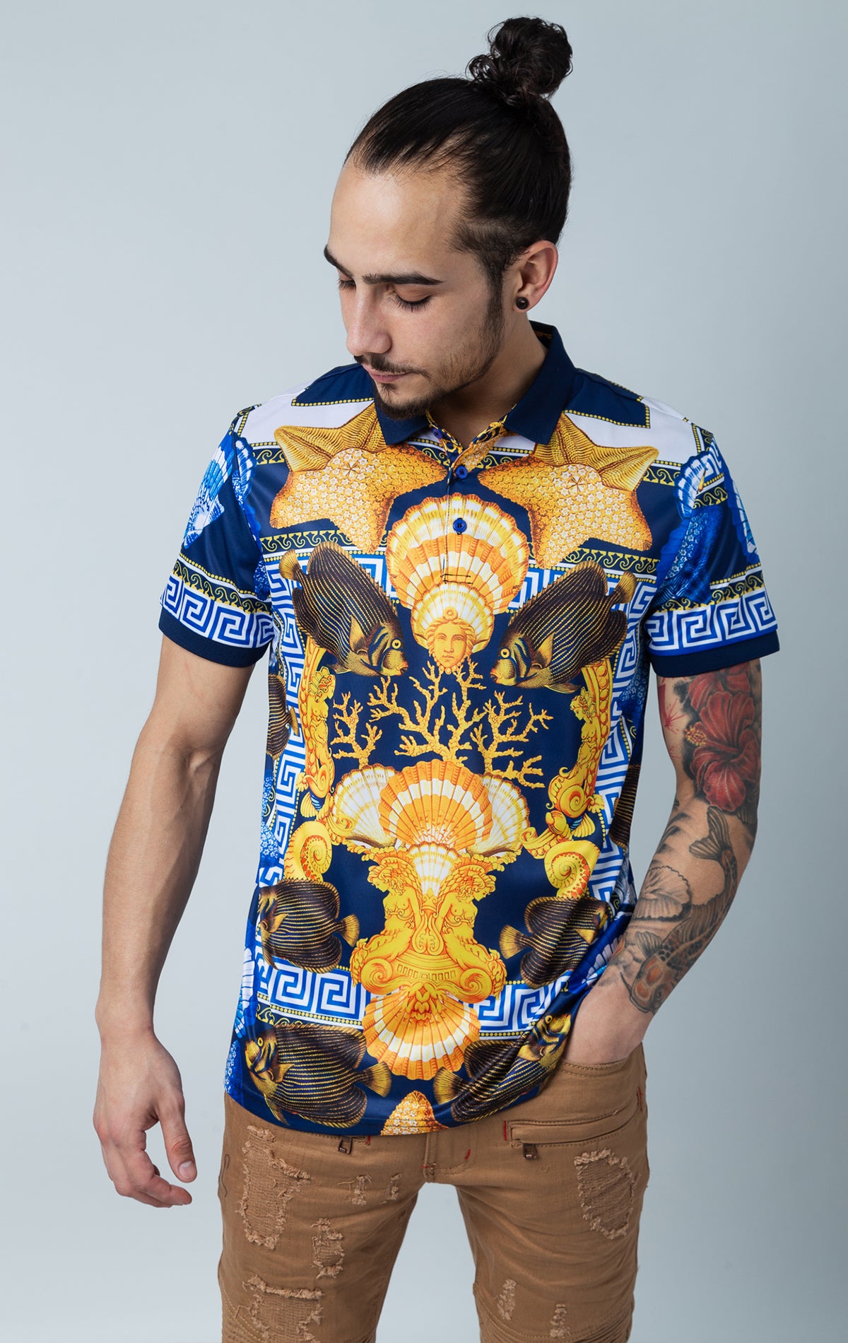 Stylized all over graphic polo shirt with collared detailing, short-sleeved composition, three button front fastening